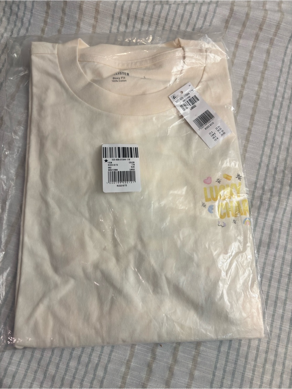 Hollister Cream Short Sleeve Tee with Yellow Chest Print